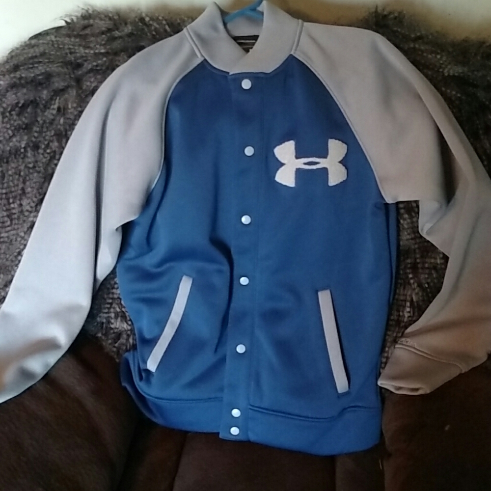 Under armour is storm varsity jacket.